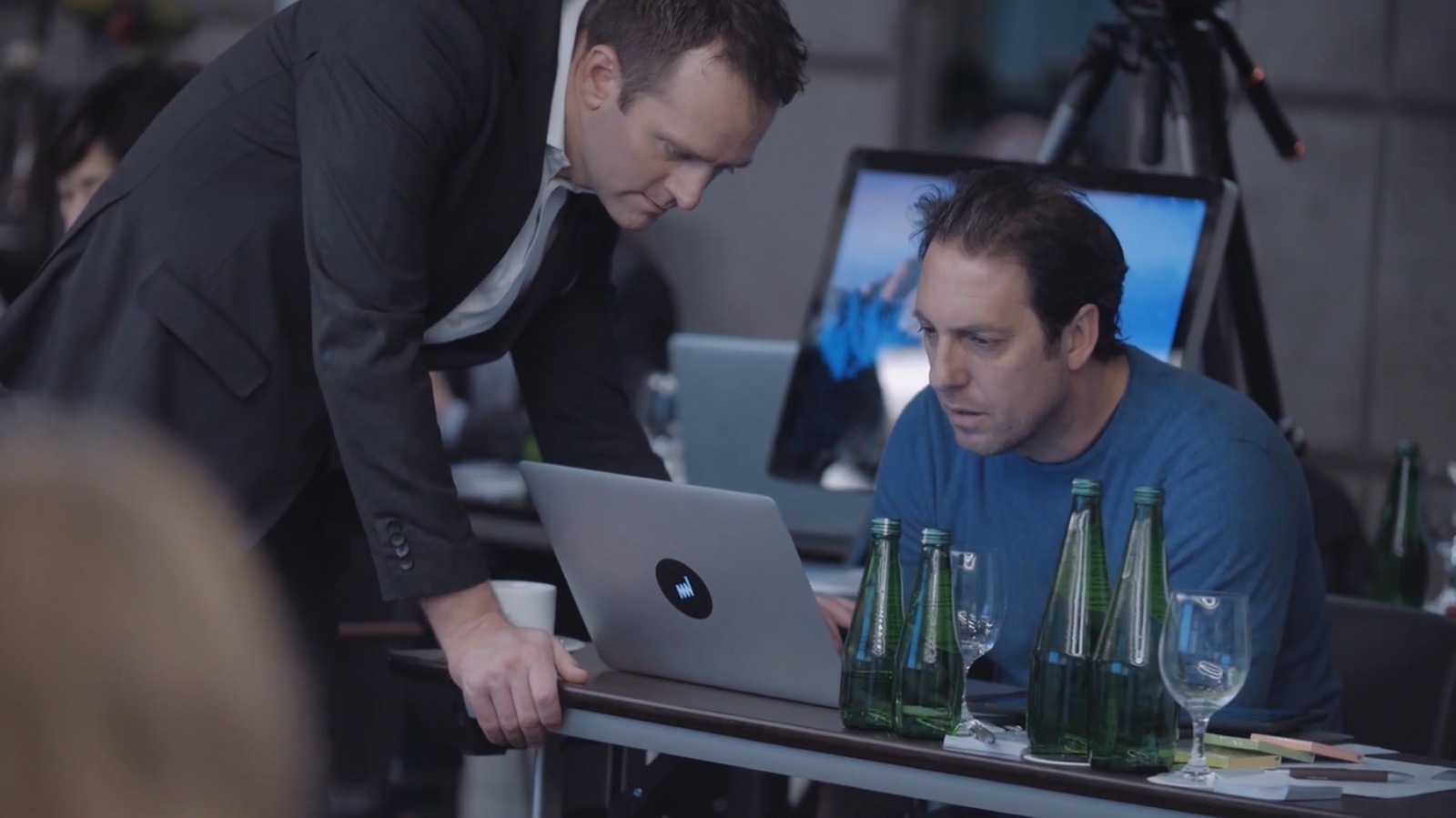 One-to-one coaching session at a laptop