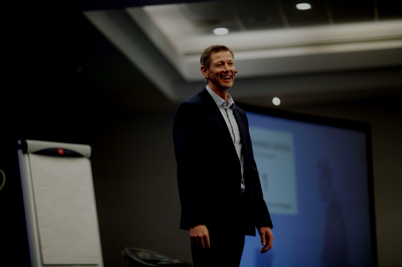 Samuel Cook on stage, teaching the art of storytelling